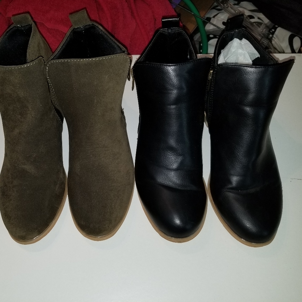 Olive green and black pair of booties.